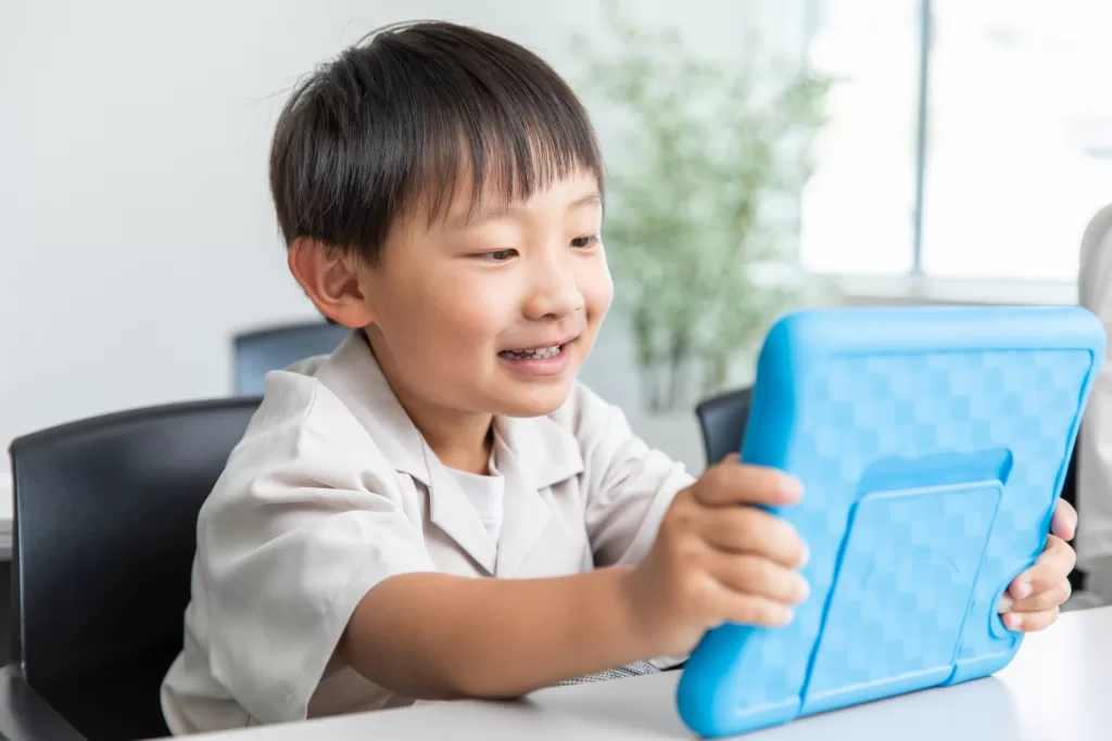 young learner studying coding in elementary school
