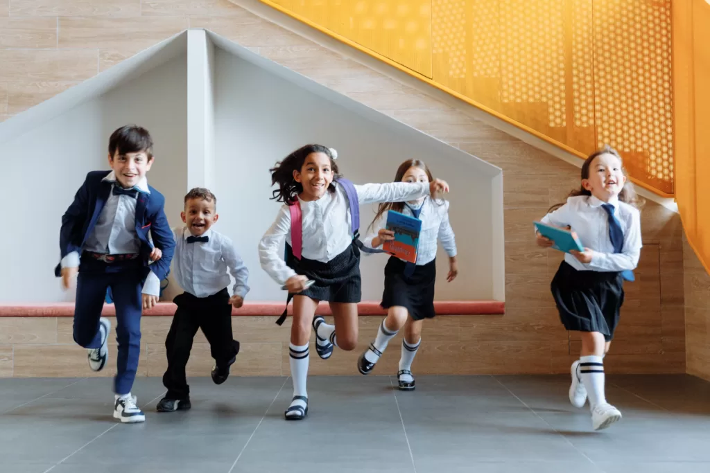 Children running to their after-school activities